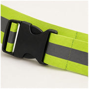 Close-up of black buckle and gray reflective stripe