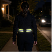 Reflective waist belt visible during an evening walk