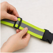 Hands adjusting the waist belt slider