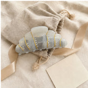 Pearl cream croissant hair claw in a linen gift pouch